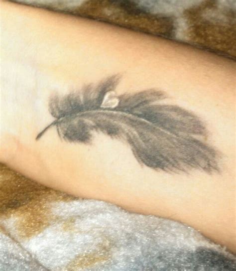 Feather tattoo | Feather tattoo, Tattoos, Animal tattoo