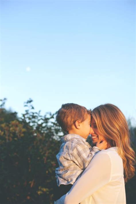 Mom And Son Cuddle At Sunset Son Photo Ideas Mother Son Photography