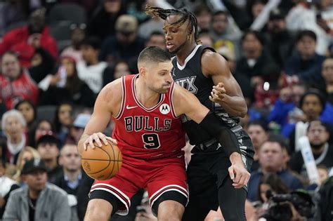 Chicago Bulls Center Nikola Vucevic 9 Drives To The Basket While