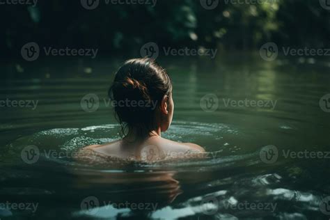 Wild swimming, rest recovery, water relaxation concept. Rear view of