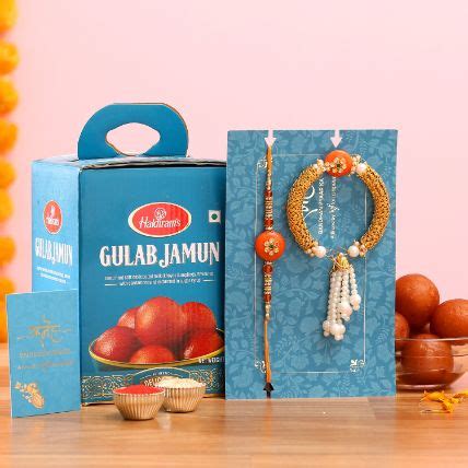 Online Orange Pearl And Lumba Rakhi Set With 1 Kg Gulab Jamun Gift