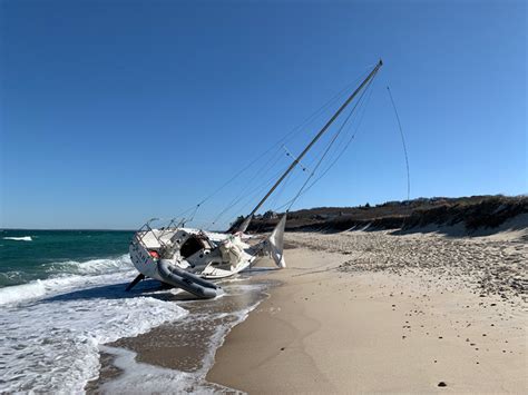 Sailboat grounds on Menemsha Beach - The Martha's Vineyard Times