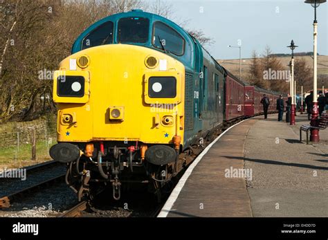 Class 37 Loco In Br Blue Colour Scheme At The Front Of A Passenger Train On The East Lancs