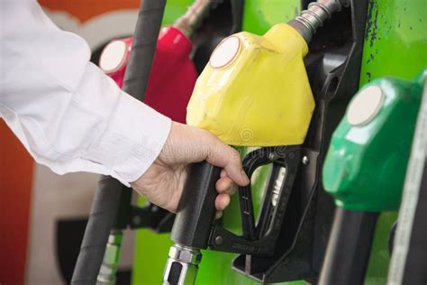 Man Putting Gasoline Fuel Into His Car Stock Image Image Of Petrol