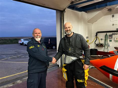 New Lifeboat Helms First Service In Command Brings Two Men And A Dog