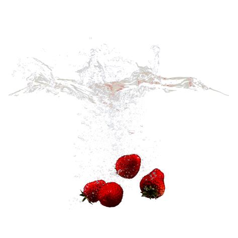 Four Strawberries Falling Into Water Fruit Water Water Splash Png