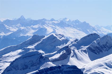 Bildet landskap natur stein fjell snø vinter himmel sol