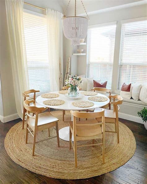 27 Versatile Round White Dining Tables To Accessorize Any Room