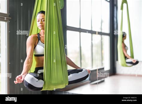 Aerial yoga swing hi-res stock photography and images - Alamy