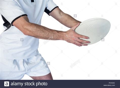 Midsection Of Rugby Player Holding The Ball Stock Photo Alamy