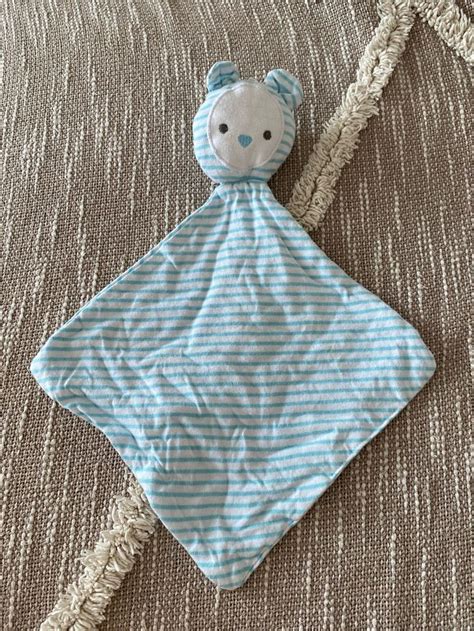 Peluche doudou plat obaibi ours rayé blanc et bleu parfait état