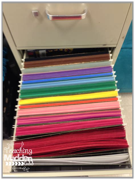 A File Cabinet Filled With Lots Of Different Colored Papers