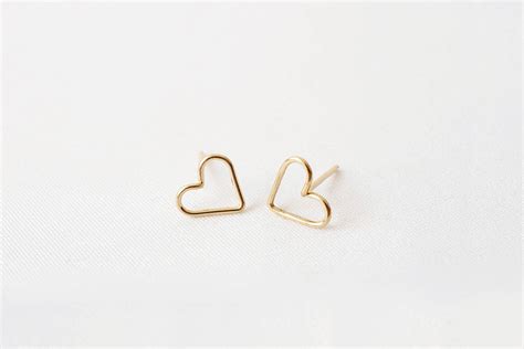 Tiny 14k Gold Heart Studs by MadeByMaru on Etsy