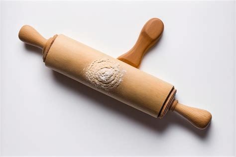 Premium Photo Top View Of A Wooden Rolling Pin Isolated On A White