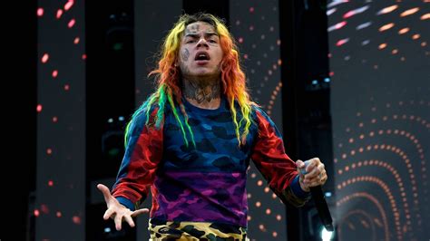 6ix9ine Facing Lawsuit From Miami Stripper For Allegedly Hitting Her With Champagne Bottle Complex