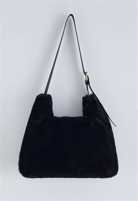 Ultra Soft Faux Fur Shoulder Bag In Black Retro Indie And Unique Fashion