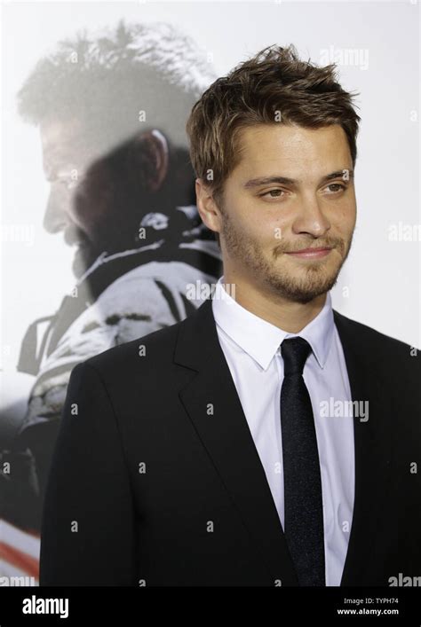 Luke Grimes arrives on the red carpet at the 'American Sniper' New York Premiere at Frederick P ...