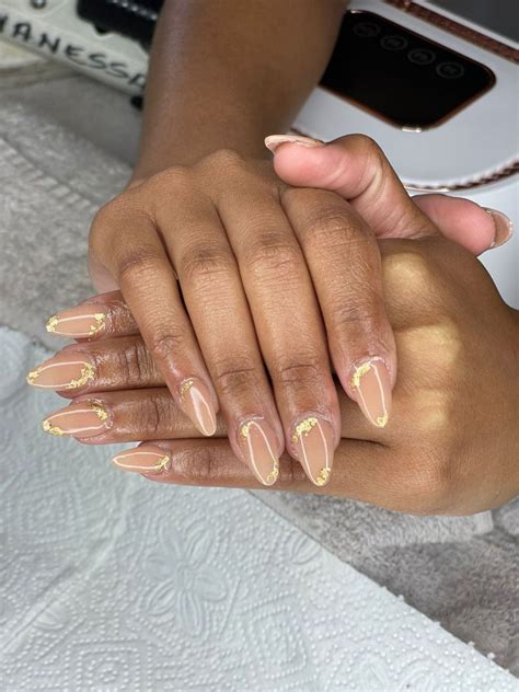 Nude Acrylic Nails With Gold Flakes