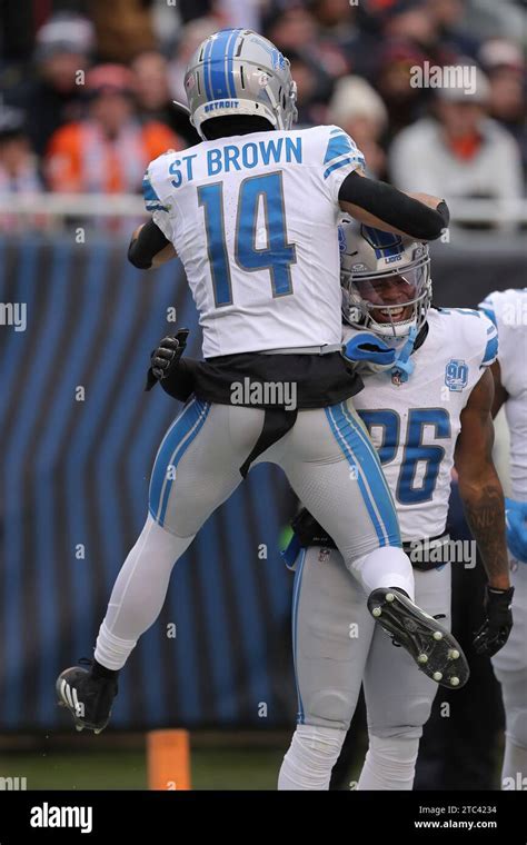 Detroit Lions Wide Receiver Amon Ra St Brown 14 Celebrates With