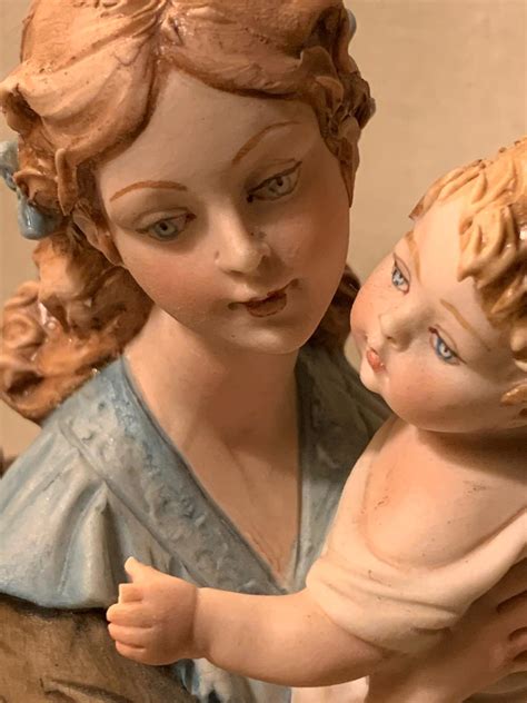 Madonna Con Bambino Statuetta Di Bruno Merli In Porcellana Capodimonte