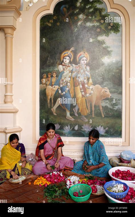 Devotees making garlands at Krishna-Balaram temple, Vrindavan, Uttar ...