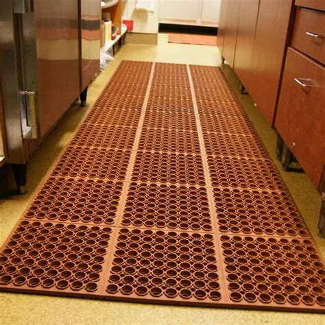 A Rubber Kitchen Floor Mat Prevents Slips on Wayward Water and Grease!