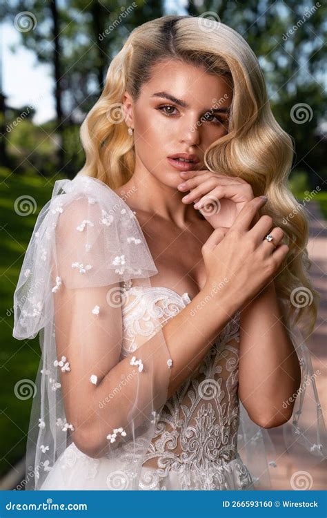 Vertical Shot Of The Pretty Woman With Nude Makeup Wearing A Bride X27