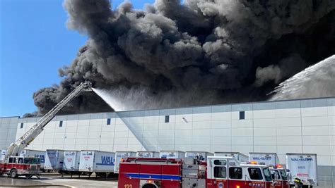 Video Crews Battle Massive Warehouse Fire At Walmart Distribution