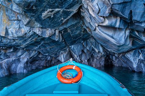 Tour Boat Exploring The Marble Caves In The General Carrera Lake ...