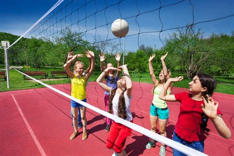 Volleyball Game Among Children Who Actively Play Stock Photo Image