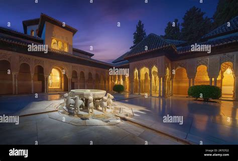 Illuminated Court Of The Lions Patio De Los Leones With Fountain At