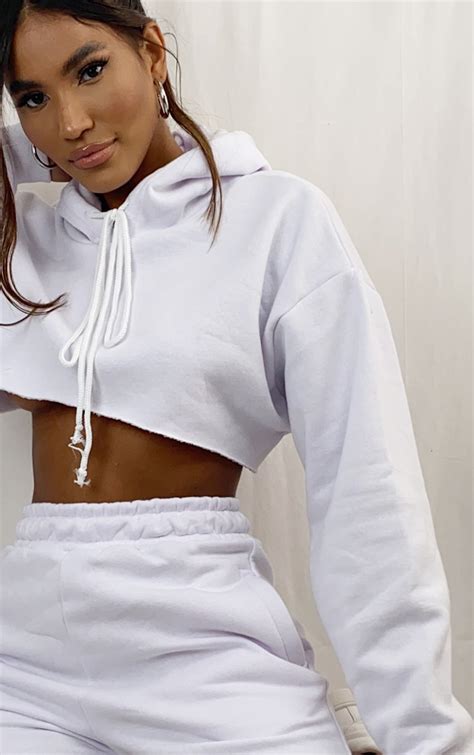 White Extreme Raw Edge Cropped Hoodie Tops Prettylittlething Uae