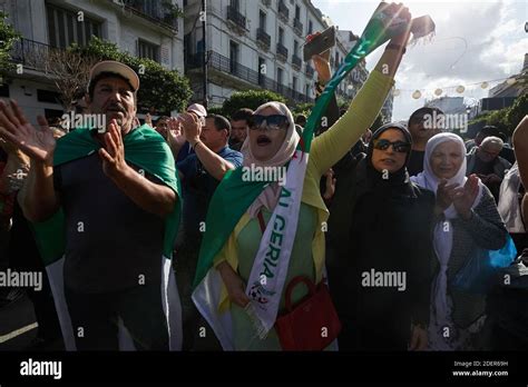 Demonstrators March During A Protest Against The Countrys Ruling Elite