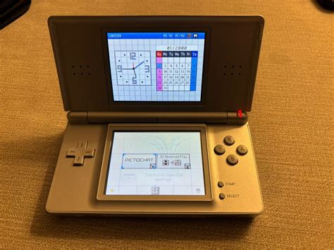 Nintendo Ds Lite Metallic Silver Handheld System With 6 Games And