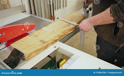 Carpenter Measuring Wooden Plank Places on Table before Sawing it with ...