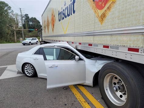 Car Runs Under Semi Trailer