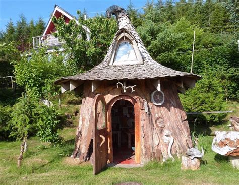 Someone Transformed This Tree Stump Into a Fancy Hobbit House