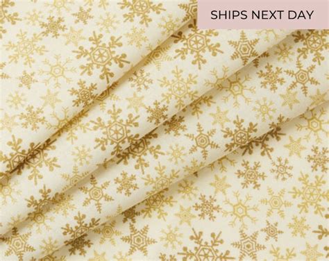 Snowflakes On Tan Metallic Cotton Fabric Cotton Christmas