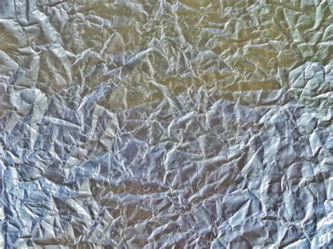 Premium Photo Crumpled Silver Texture Aluminum Foil Background