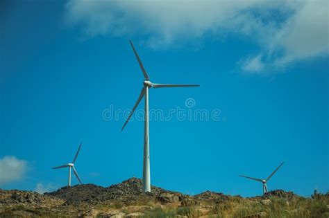 Wind Turbines For Electric Power Generation Over Hills Stock Image