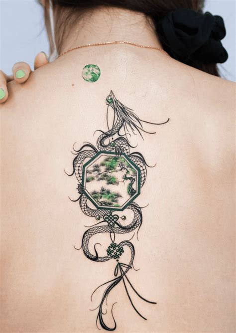 35 Rejuvenating Green Dragon Tattoos To Breath Back Life