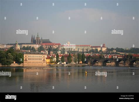 Panoramic View Of Prague Castle And Charles Bridge At Sunrise Prague Czech Republic Stock