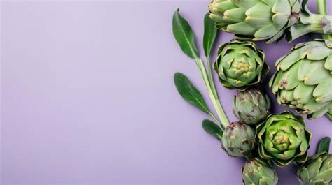 Premium Photo A Ripe Artichoke Surrounded By Some Artichoke Hearts