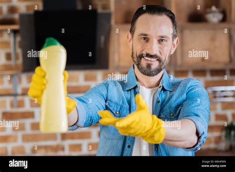 optimistic male cleaner sharing  cleanser stock photo alamy