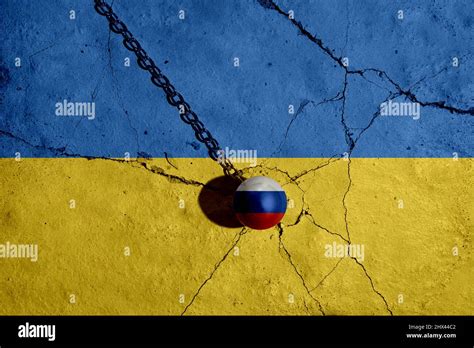 Ukraine Painted Flag On A Wall With A Crack War Conflict Between