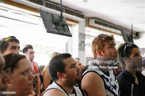 Fans In Bali Watch The 2013 Afl Grand Final Photos and Premium High Res ...
