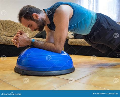 Muscular Man Doing Bosu Ball Push Ups At Home Stock Image Image Of