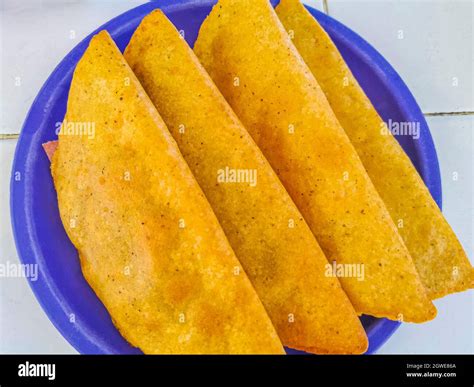 Mexican Empanada On Blue Plate White Background From Playa Del Carmen