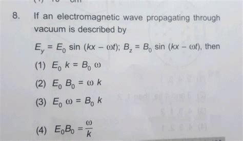 An Electromagnetic Wave Passing Through Vacuum Is Described By The