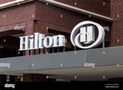 Hilton Hotel logo sign. Hilton is an international hotel and resort ...